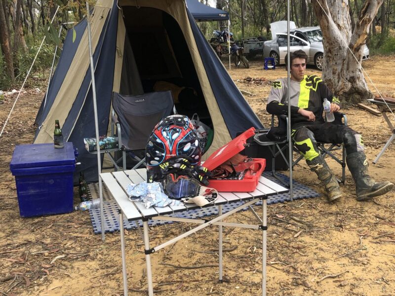 The Povo Racing camp setup: tent, chairs and toolbox trackside