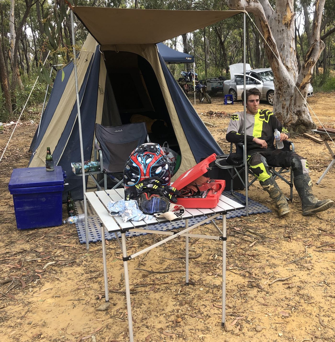The Povo Racing camp setup: tent, chairs and toolbox trackside