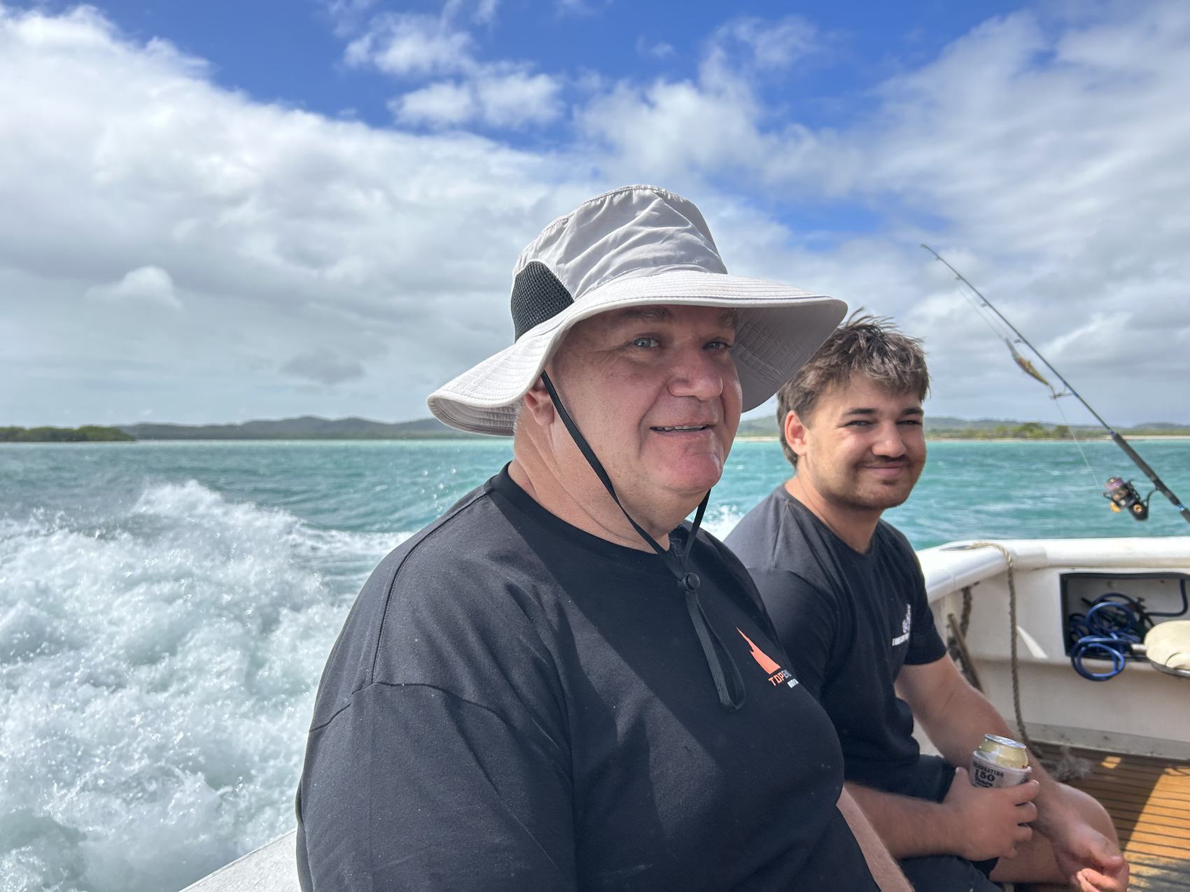 Grant and Max on a fishing charter after the ride